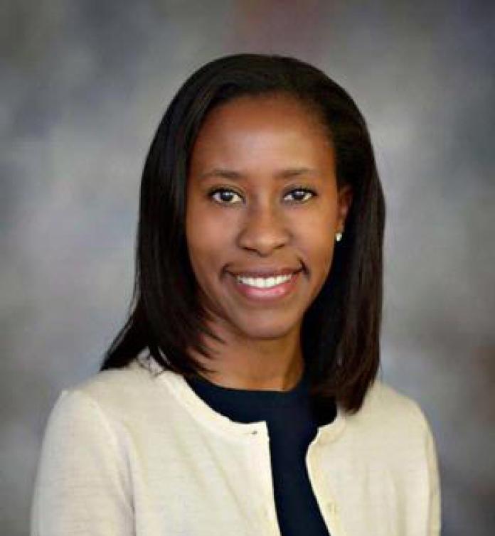 A photo of Erika Augustine, MD, MS.